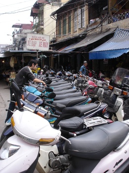 Want to park your motobike?  Park on sidewalk!