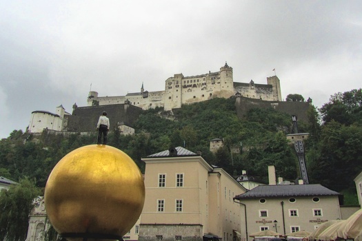 Gazing at castle from atop ball